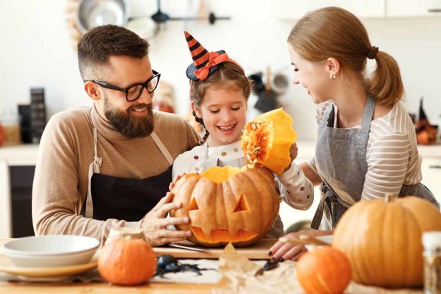 sober halloween family enjoying a sober halloween with their child