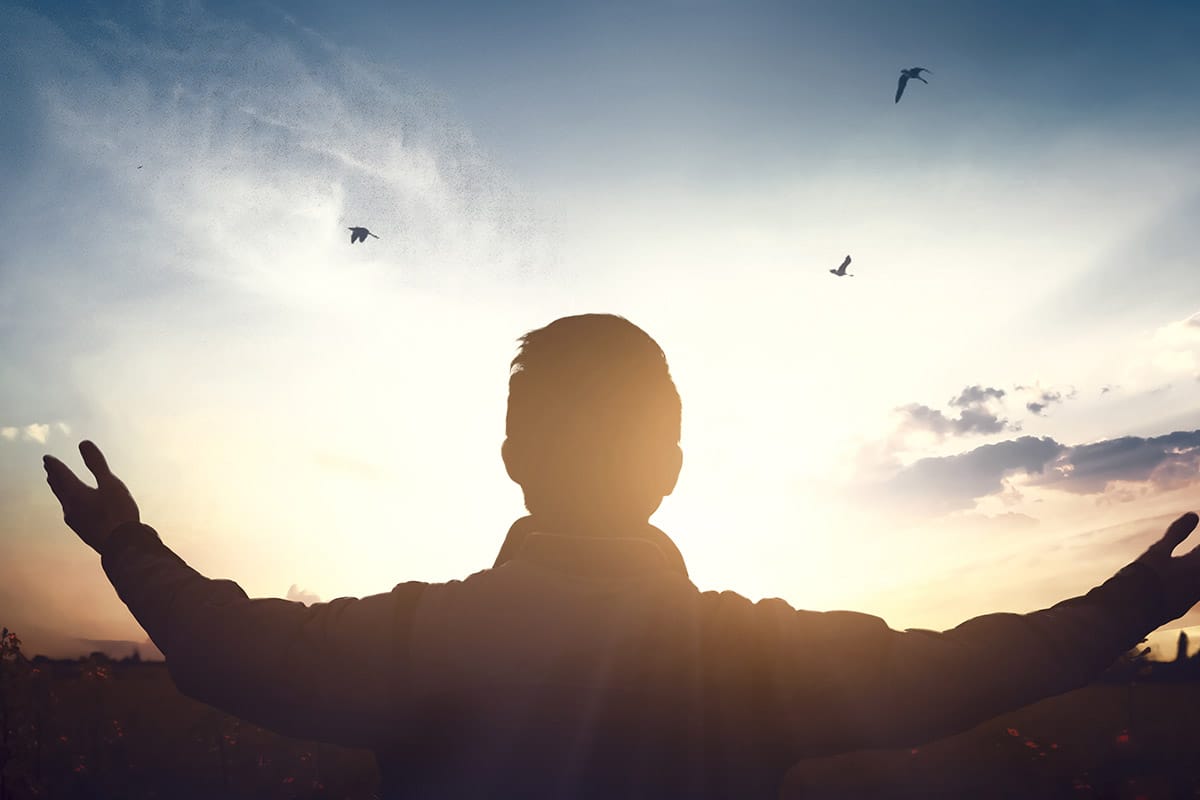 What Are the Benefits of Faith Based Treatment_ man in front of sunset