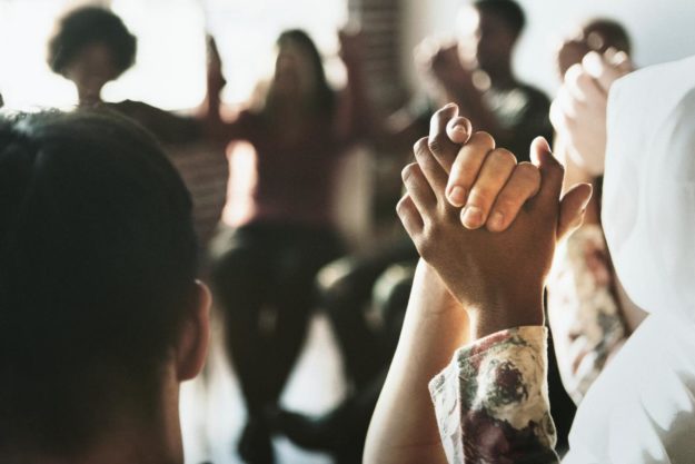 Why Should I Choose a Faith Based Treatment_ two people holding hands