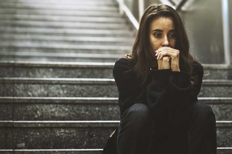 Help For Teens Engaged In Self Harm Woman Contemplating Types of Alcoholics