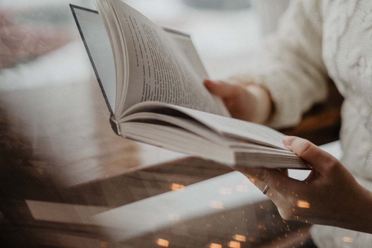 individual reading about life skills for addiction recovery