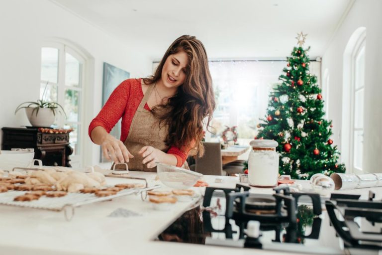 3 Techniques to Stay Sober This Holiday Season women baking during christmas