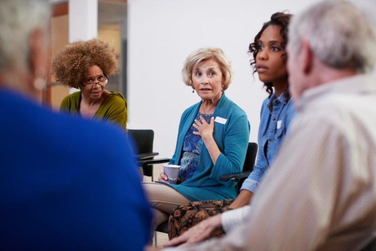 Cocaine Addiction 3 Benefits of Getting Cocaine Addiction Treatment a group of people discuss the benefits of getting cocaine addiction treatment