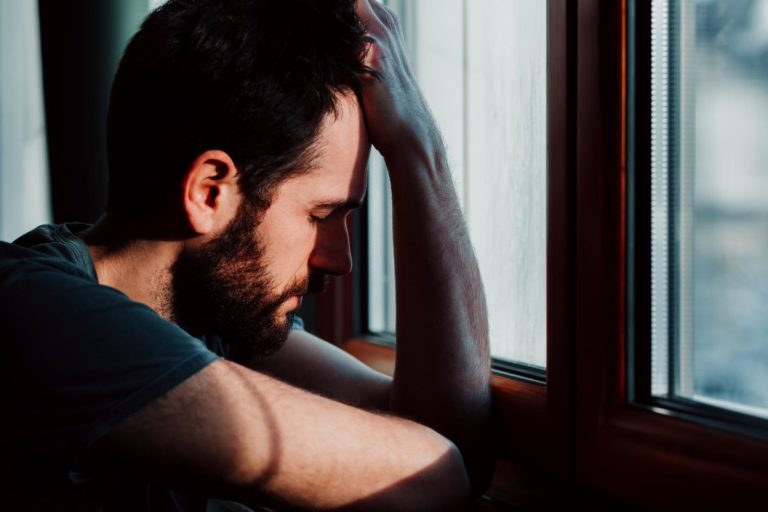 Why is Meth so Dangerous_ a man holds his head as he wonders about the dangers of meth