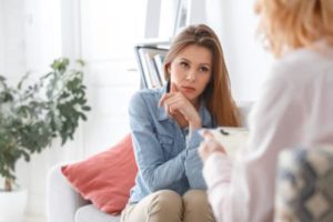 Woman learning self-harm treatment