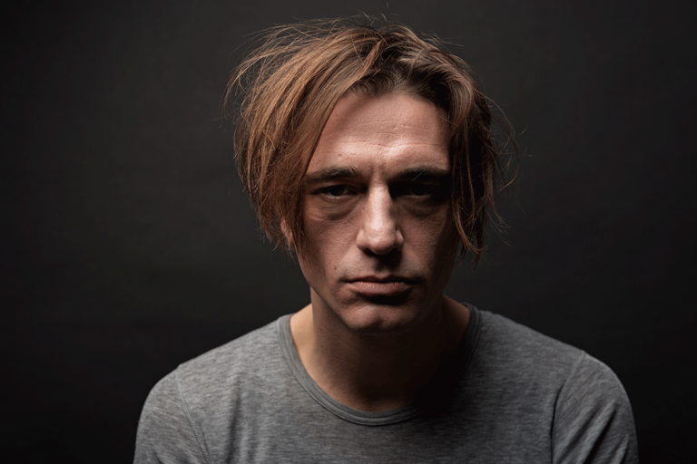 Heroin-and-the-Brain A man thinking about heroin and the brain