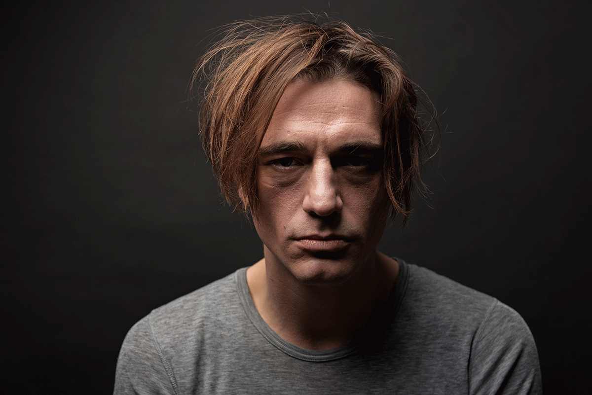 Heroin-and-the-Brain A man thinking about heroin and the brain