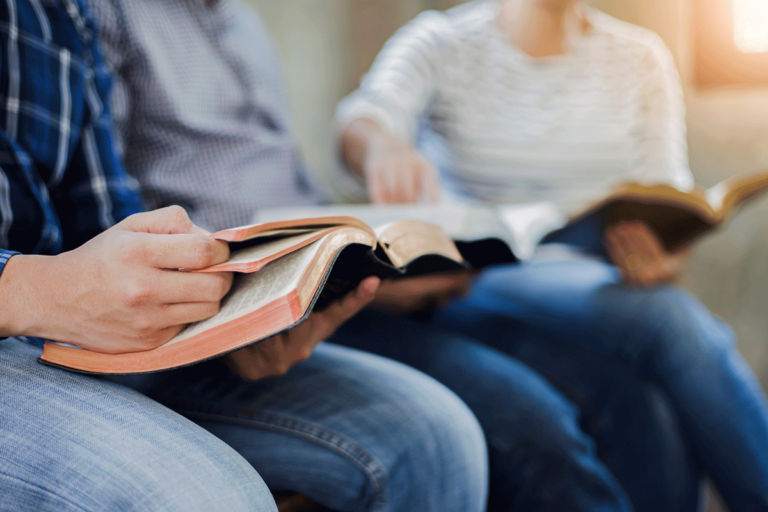 Unique-Elements-of-Christian-Rehab-Centers Two people with open Bibles in Christian rehab centers