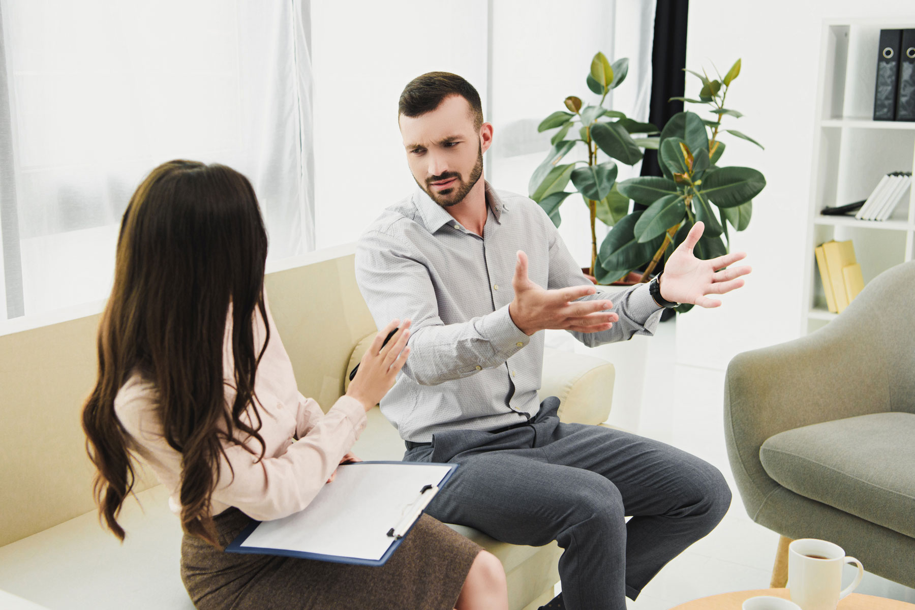 How Discipleship Programs Support Addiction Recovery Two people discuss how discipleship helps with addiction